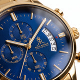 Close-up of Laguna Drip gold watch with blue chronograph dial.