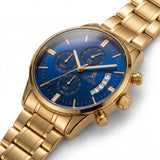 Laguna Drip gold watch with blue dial, angled view.