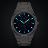Melrose Haze frosted silver watch with luminous blue hands and markers in the dark.