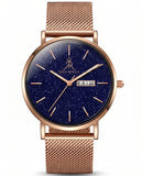 Venice Stardust rose gold watch with a blue stardust dial and mesh bracelet, front view.